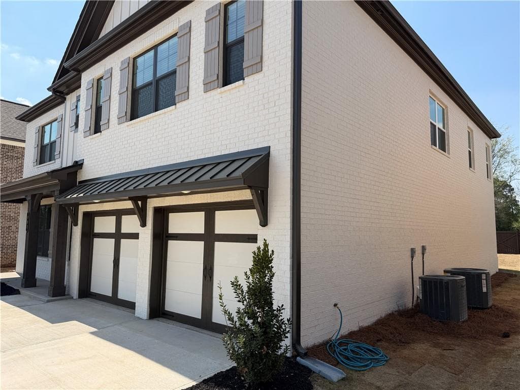 5 bedroom, 4 bathroom, 3,550 sq ft single family residence for sale at 662 Secret Garden Lane, Dacula, GA 30019 — photo 3