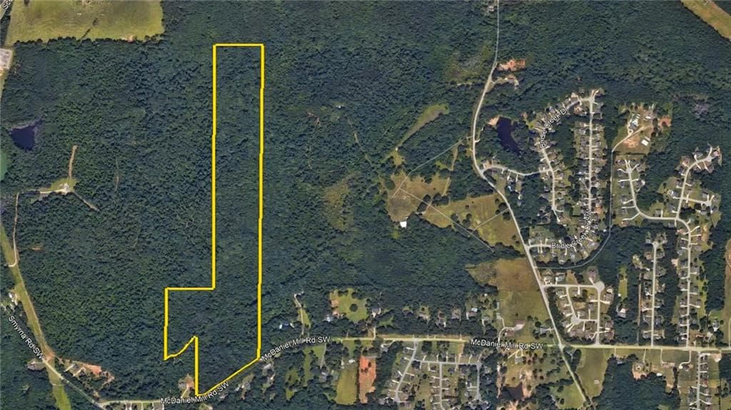 unimproved land for sale at 2229 Mcdaniel Mill Road, Conyers, GA 30094 — photo 5
