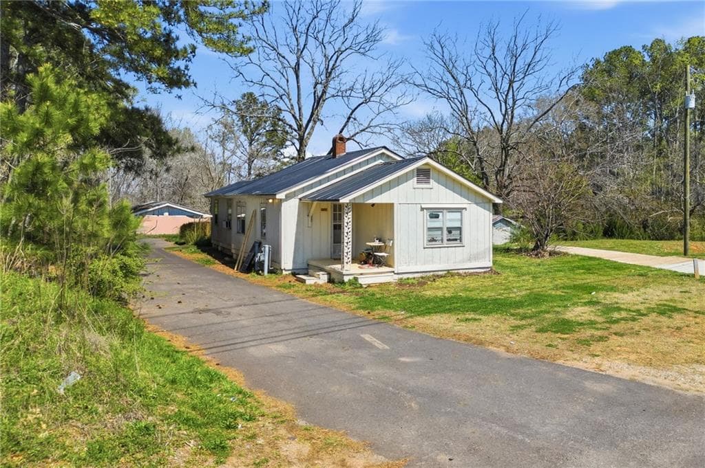 3 bedroom, 1 bathroom single family residence for sale at 3823 Cumming Highway, Canton, GA 30115 — photo 2
