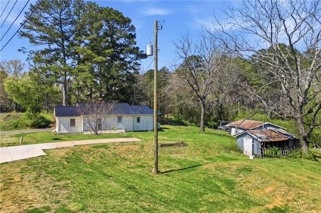 3 bedroom, 1 bathroom single family residence for sale at 3823 Cumming Highway, Canton, GA 30115 — photo 4