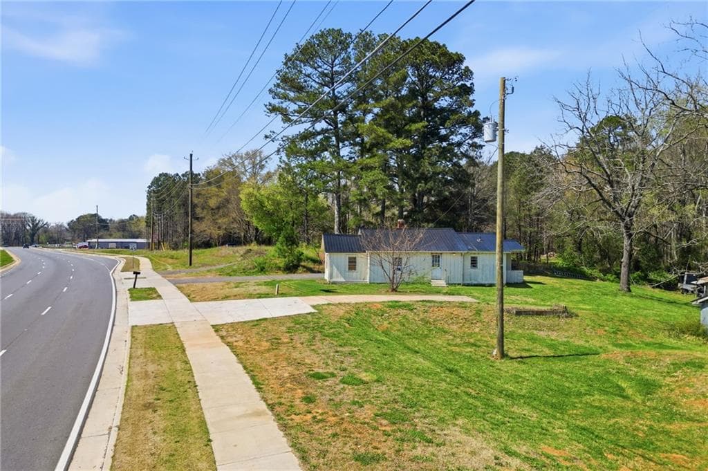 3 bedroom, 1 bathroom single family residence for sale at 3823 Cumming Highway, Canton, GA 30115 — photo 5