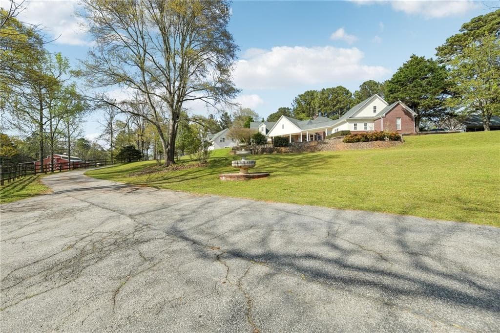 7 bedroom, 5 bathroom, 3,357 sq ft single family residence for sale at 228 Indian Creek Road, Locust Grove, GA 30248 — photo 3