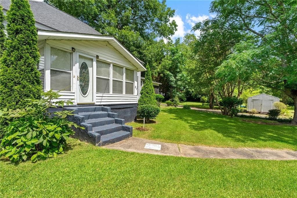 3 bedroom, 1 bathroom, 1,244 sq ft single family residence under contract at 31 Elm Street, Hampton, GA 30228 — photo 2