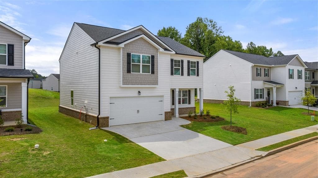 4 bedroom, 3 bathroom, 2,175 sq ft single family residence for sale at 8565 Secretariat Drive, Lithonia, GA 30058 — photo 2