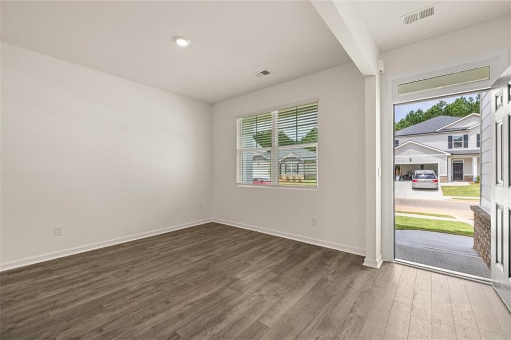 4 bedroom, 3 bathroom, 2,175 sq ft single family residence for sale at 8565 Secretariat Drive, Lithonia, GA 30058 — photo 4