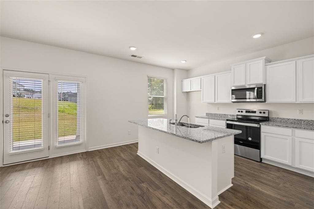 4 bedroom, 3 bathroom, 2,175 sq ft single family residence for sale at 8565 Secretariat Drive, Lithonia, GA 30058 — photo 6
