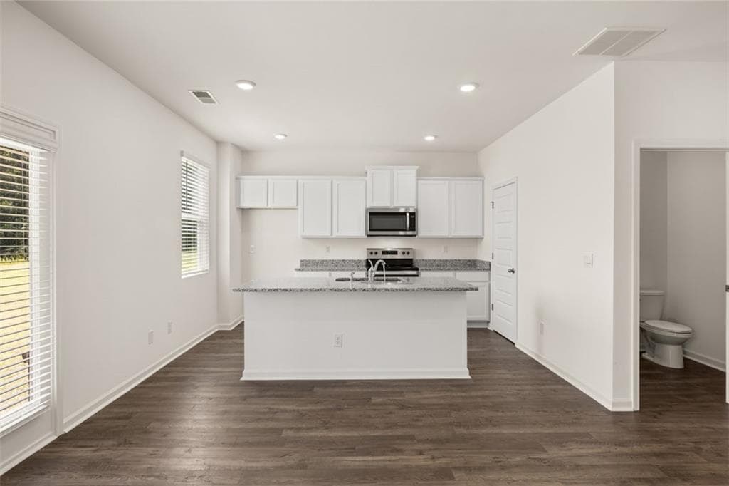 4 bedroom, 3 bathroom, 2,175 sq ft single family residence for sale at 8565 Secretariat Drive, Lithonia, GA 30058 — photo 7