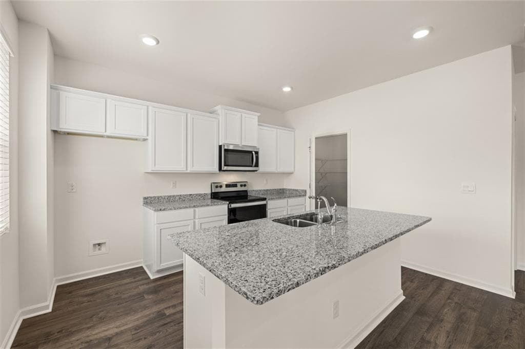 4 bedroom, 3 bathroom, 2,175 sq ft single family residence for sale at 8565 Secretariat Drive, Lithonia, GA 30058 — photo 8