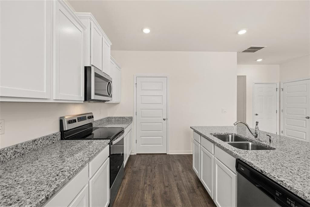 4 bedroom, 3 bathroom, 2,175 sq ft single family residence for sale at 8565 Secretariat Drive, Lithonia, GA 30058 — photo 9