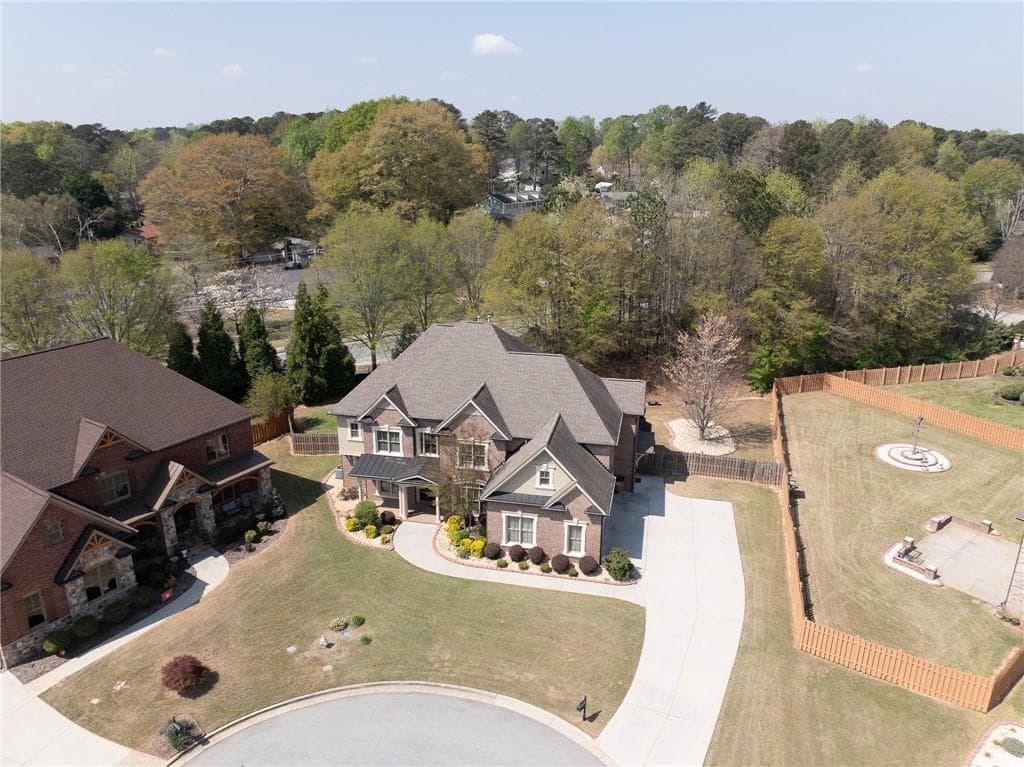 5 bedroom, 5 bathroom, 4,873 sq ft single family residence for sale at 5127 Bentwater Lane, Lilburn, GA 30047 — photo 2