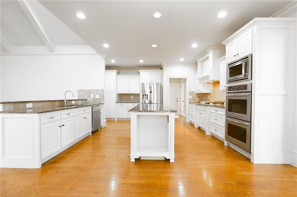 5 bedroom, 5 bathroom, 4,873 sq ft single family residence for sale at 5127 Bentwater Lane, Lilburn, GA 30047 — photo 8