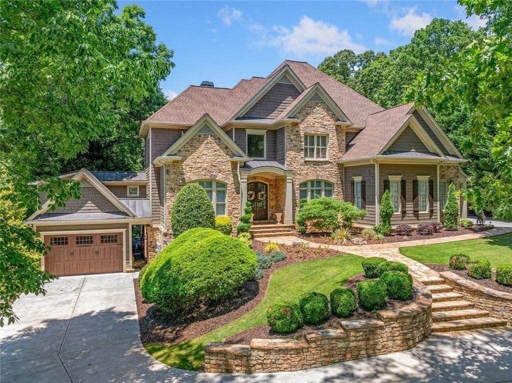 8 bedroom, 8 bathroom, 8,268 sq ft single family residence sold at 708 Thompson Falls Drive, Canton, GA 30114