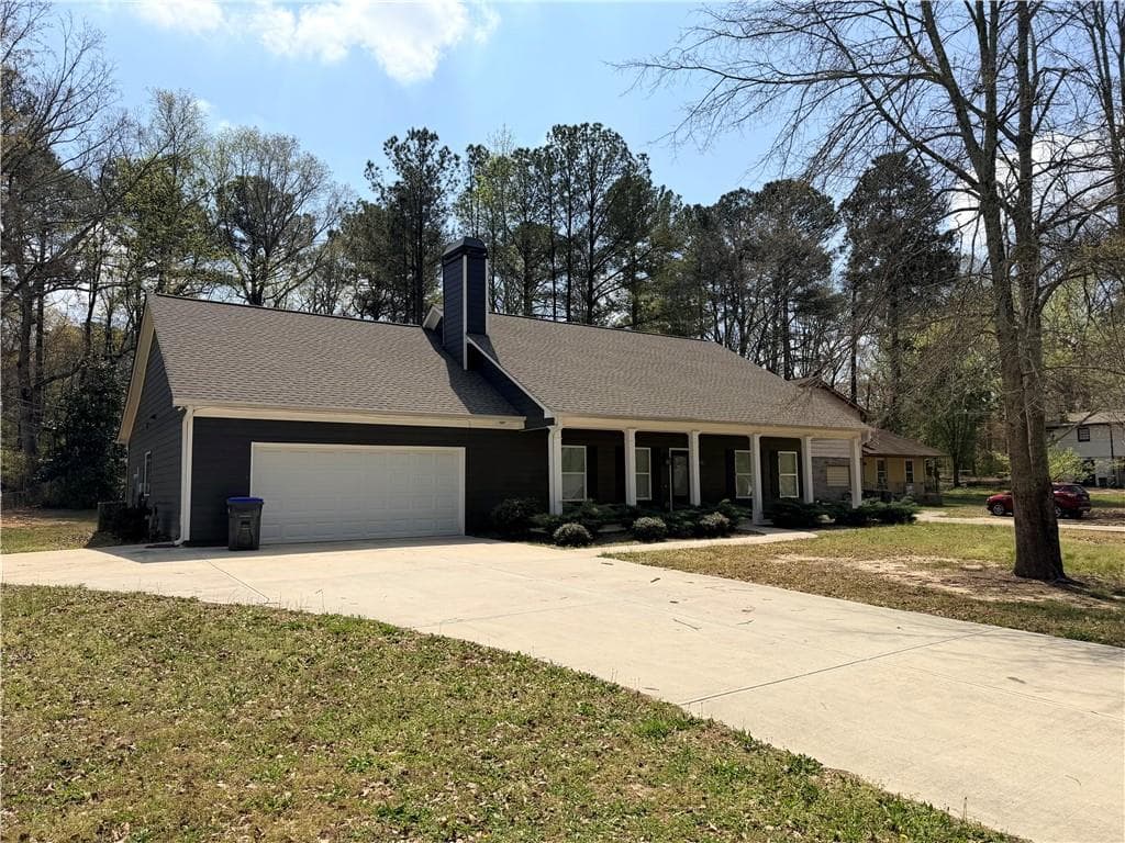 3 bedroom, 2 bathroom, 1,682 sq ft single family residence for sale at 147 Zion Wood Road, Loganville, GA 30052 — photo 2