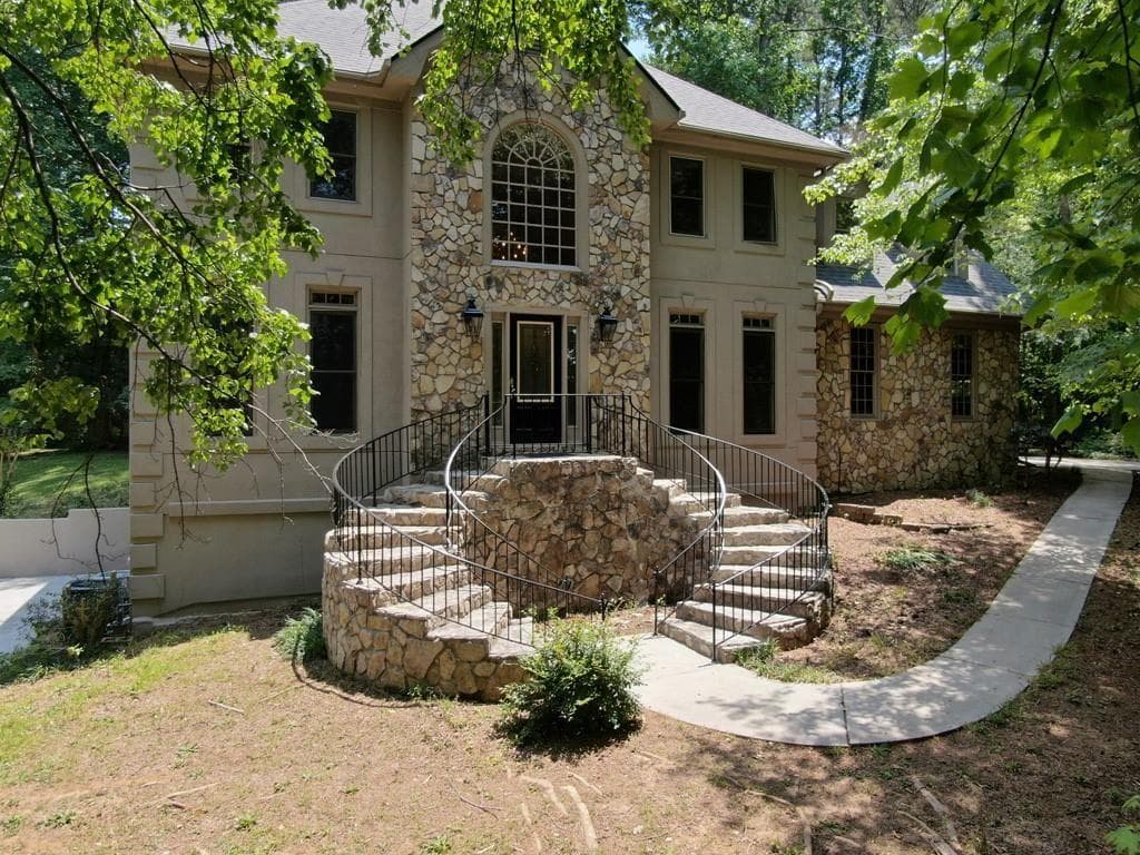 4 bedroom, 3 bathroom, 4,384 sq ft single family residence for sale at 3790 Belle Glade Trail, Snellville, GA 30039 — photo 4