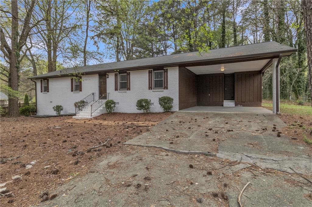 3 bedroom, 2 bathroom, 1,614 sq ft single family residence for sale at 5521 E Wind Drive, Lilburn, GA 30047