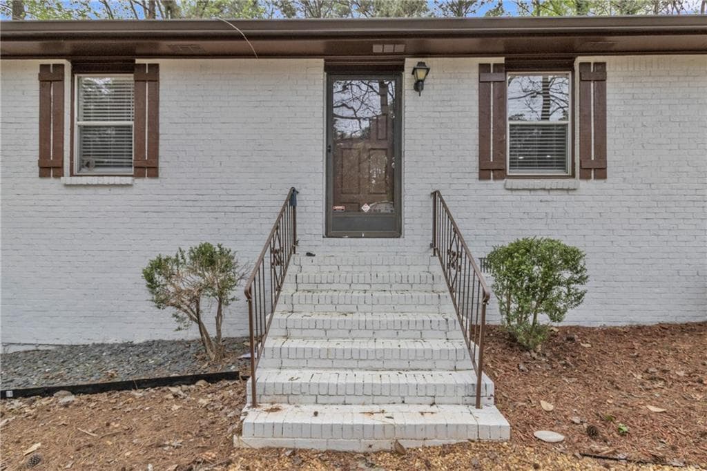 3 bedroom, 2 bathroom, 1,614 sq ft single family residence for sale at 5521 E Wind Drive, Lilburn, GA 30047 — photo 4