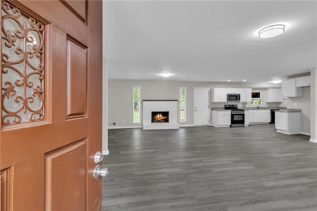 3 bedroom, 2 bathroom, 1,614 sq ft single family residence for sale at 5521 E Wind Drive, Lilburn, GA 30047 — photo 5
