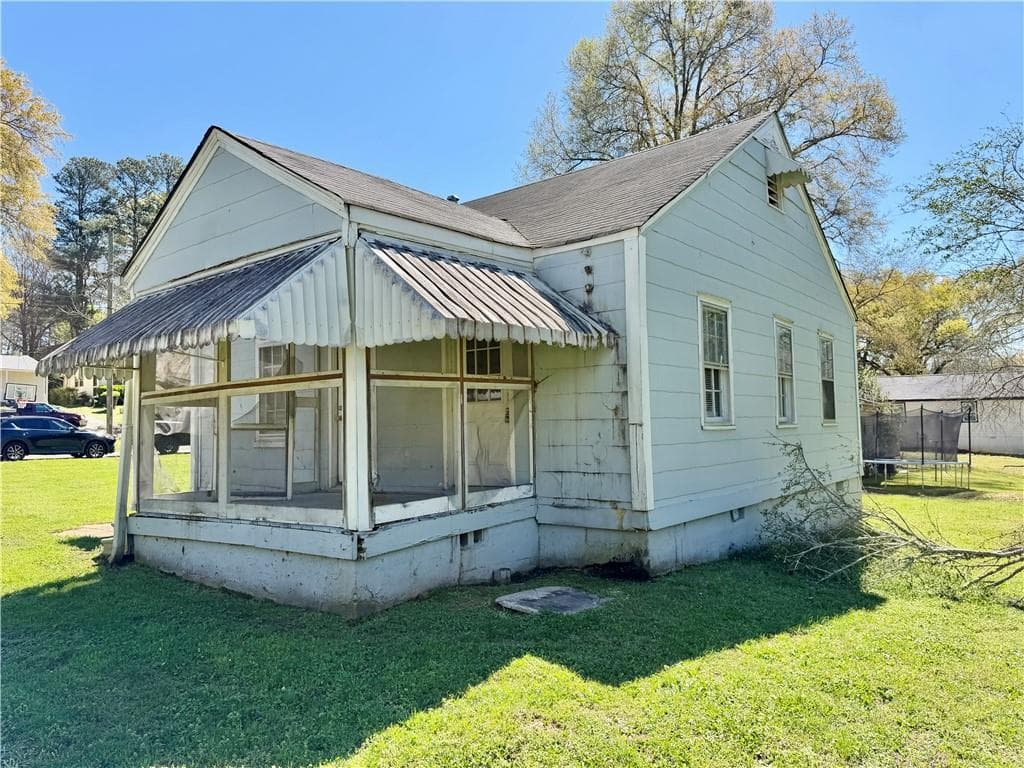 2 bedroom, 1 bathroom, 702 sq ft single family residence sold at 7107 Geiger Street, Covington, GA 30014