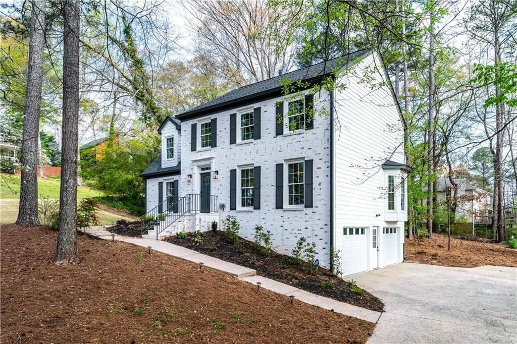 4 bedroom, 3 bathroom, 2,235 sq ft single family residence sold at 5200 Ozark Lane, Marietta, GA 30062