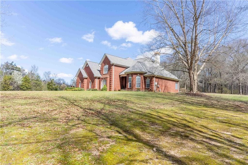 4 bedroom, 4 bathroom, 2,769 sq ft single family residence for sale at 2101 Indian Shoals Road, Loganville, GA 30052
