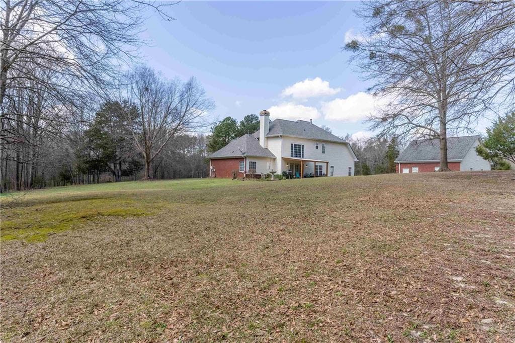 4 bedroom, 4 bathroom, 2,769 sq ft single family residence for sale at 2101 Indian Shoals Road, Loganville, GA 30052 — photo 3