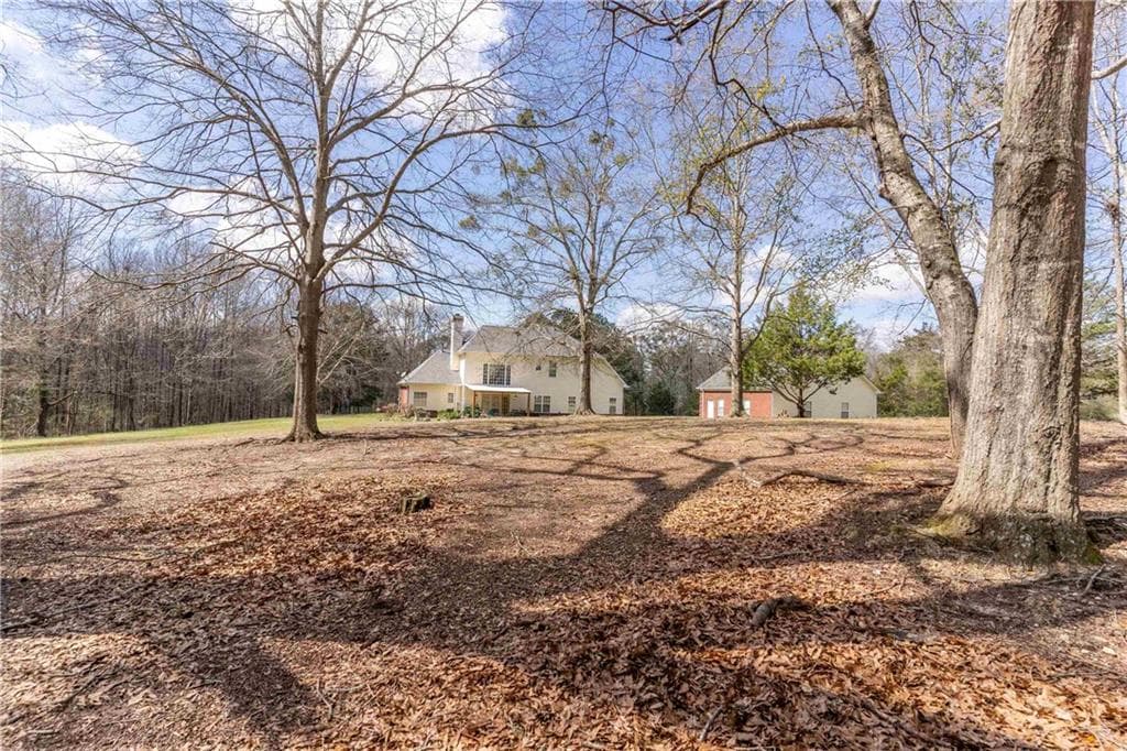 4 bedroom, 4 bathroom, 2,769 sq ft single family residence for sale at 2101 Indian Shoals Road, Loganville, GA 30052 — photo 4
