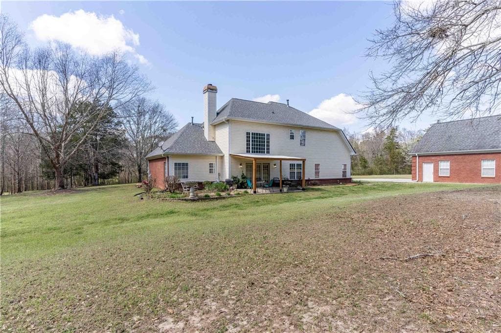 4 bedroom, 4 bathroom, 2,769 sq ft single family residence for sale at 2101 Indian Shoals Road, Loganville, GA 30052 — photo 5