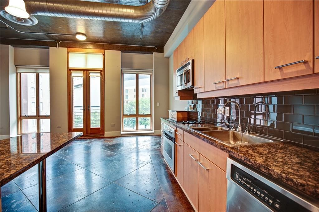 1 bedroom, 1 bathroom, 1,090 sq ft condominium for sale at 123 Luckie Street 2510, Atlanta, GA 30303 — photo 1 of 28