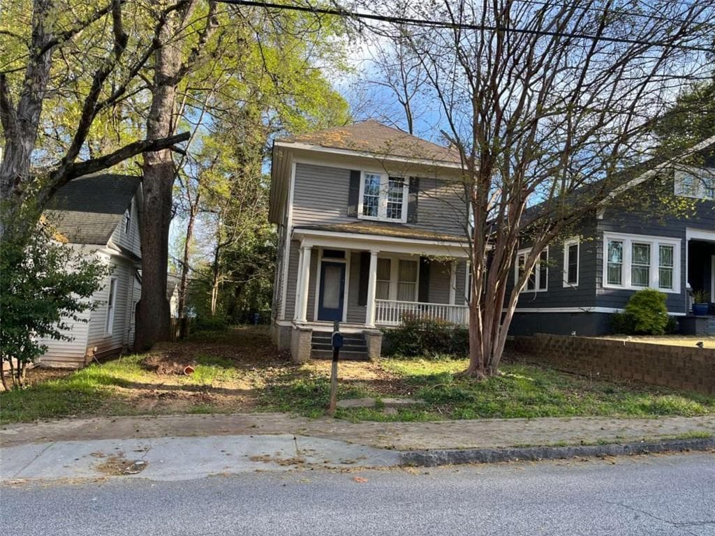 3 bedroom, 2 bathroom, 2,352 sq ft single family residence for sale at 1037 OAK Street, Atlanta, GA 30310 — photo 1 of 17