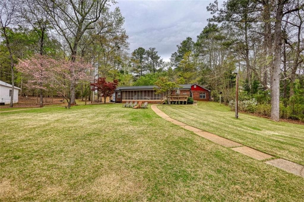 4 bedroom, 3 bathroom, 2,060 sq ft single family residence for sale at 1665 County Line Ext, Mansfield, GA 30055 — photo 2