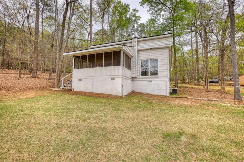 2 bedroom, 1 bathroom, 1,050 sq ft single family residence for sale at 1697 County Line Ext, Mansfield, GA 30055 — photo 2