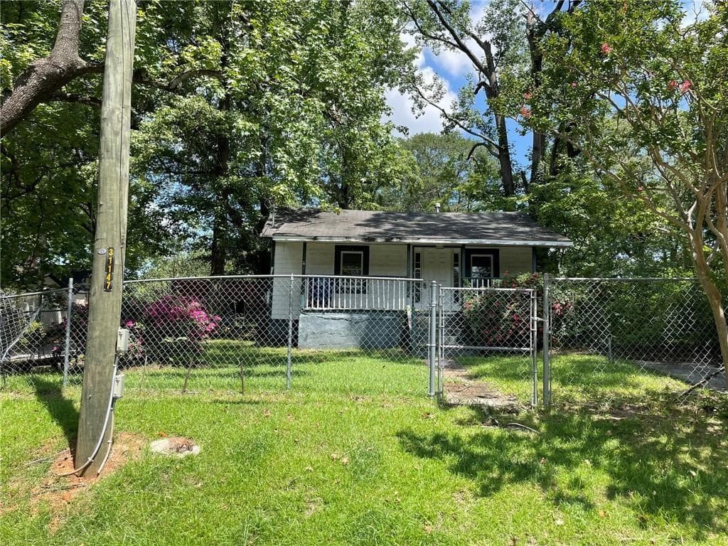 3 bedroom, 1 bathroom, 880 sq ft single family residence for sale at 1199 Warfield Street, Atlanta, GA 30318 — photo 2