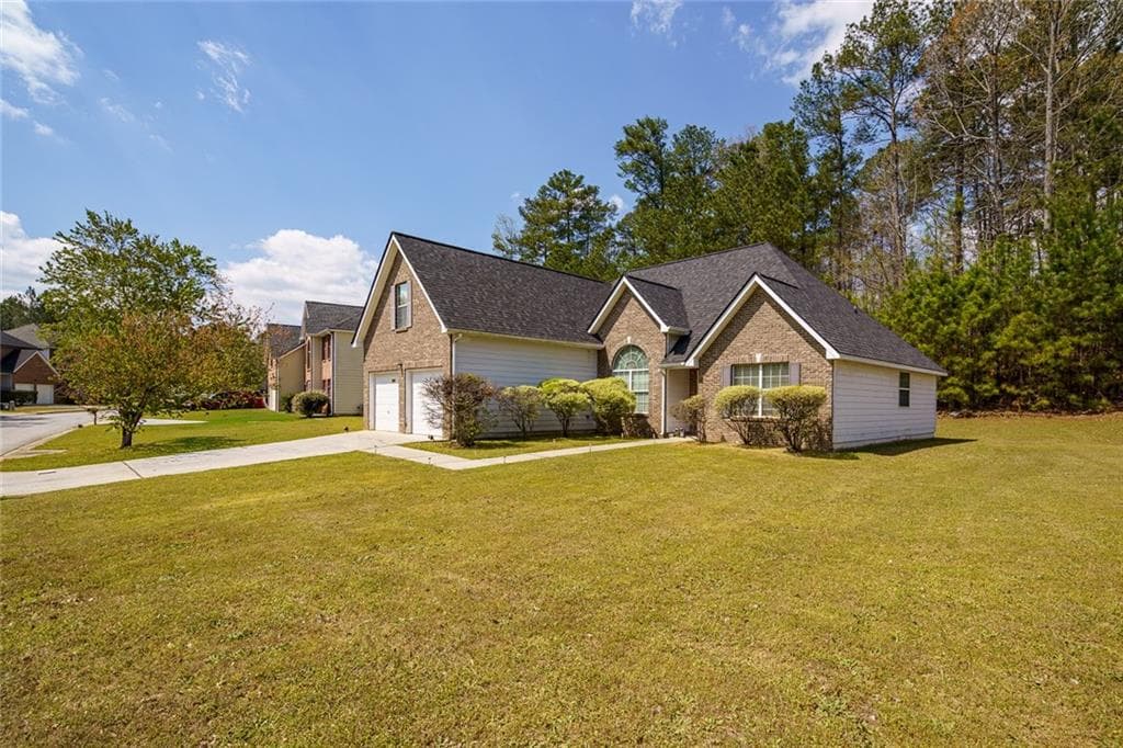 4 bedroom, 4 bathroom single family residence for sale at 6869 Fireside Lane, Atlanta, GA 30349 — photo 2