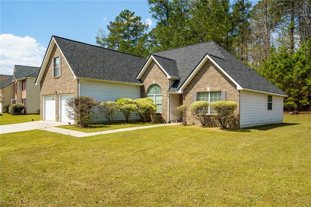 4 bedroom, 4 bathroom single family residence for sale at 6869 Fireside Lane, Atlanta, GA 30349 — photo 3