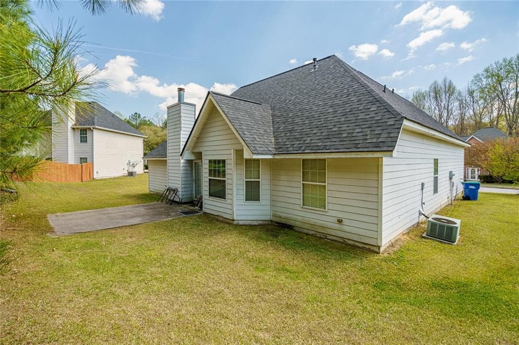 4 bedroom, 4 bathroom single family residence for sale at 6869 Fireside Lane, Atlanta, GA 30349 — photo 5
