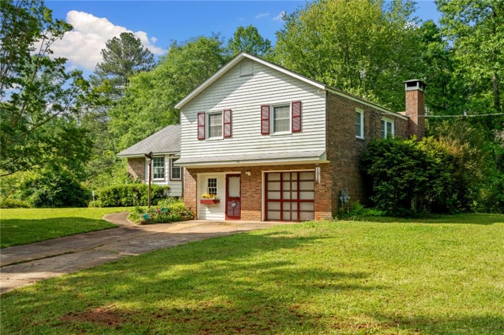 4 bedroom, 3 bathroom, 2,102 sq ft single family residence for sale at 768 Burwell Road, Carrollton, GA 30117 — photo 2