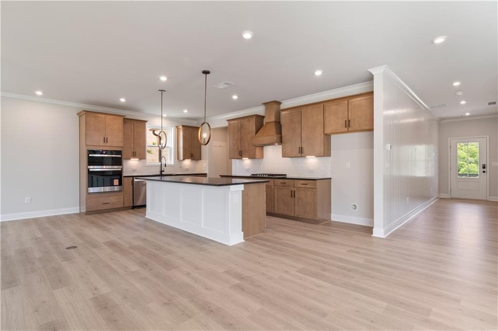 5 bedroom, 4 bathroom, 3,133 sq ft single family residence for sale at 7525 Homer Drive, Cumming, GA 30028 — photo 6