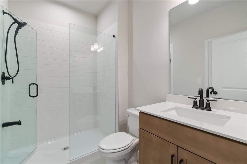 5 bedroom, 4 bathroom, 3,133 sq ft single family residence for sale at 7525 Homer Drive, Cumming, GA 30028 — photo 8