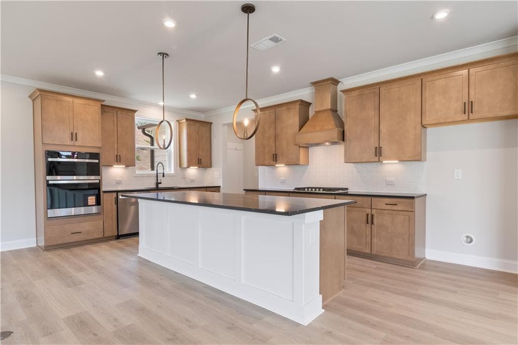 5 bedroom, 4 bathroom, 3,133 sq ft single family residence for sale at 7525 Homer Drive, Cumming, GA 30028 — photo 9