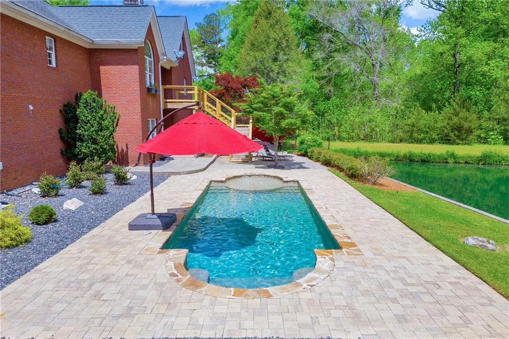 5 bedroom, 4 bathroom, 4,075 sq ft single family residence for sale at 6200 Bent Tree Cove, Murrayville, GA 30564 — photo 10