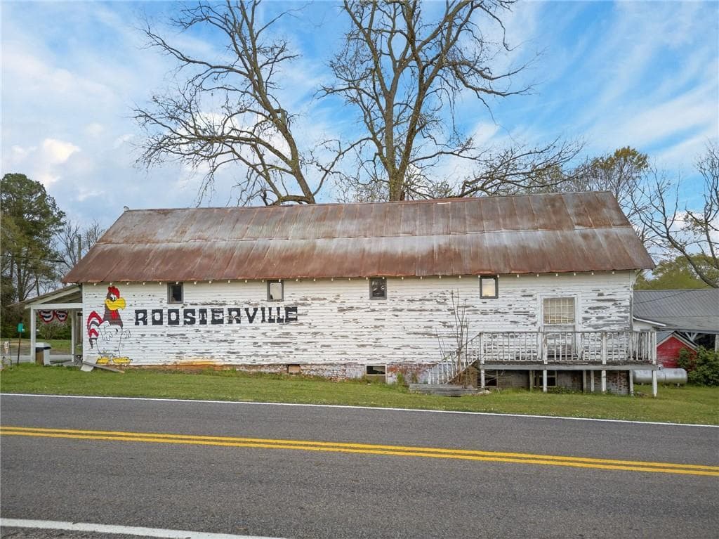 6 bedroom, 5 bathroom, 3,263 sq ft single family residence for sale at 3590 Roosterville Road, Roopville, GA 30170 — photo 3
