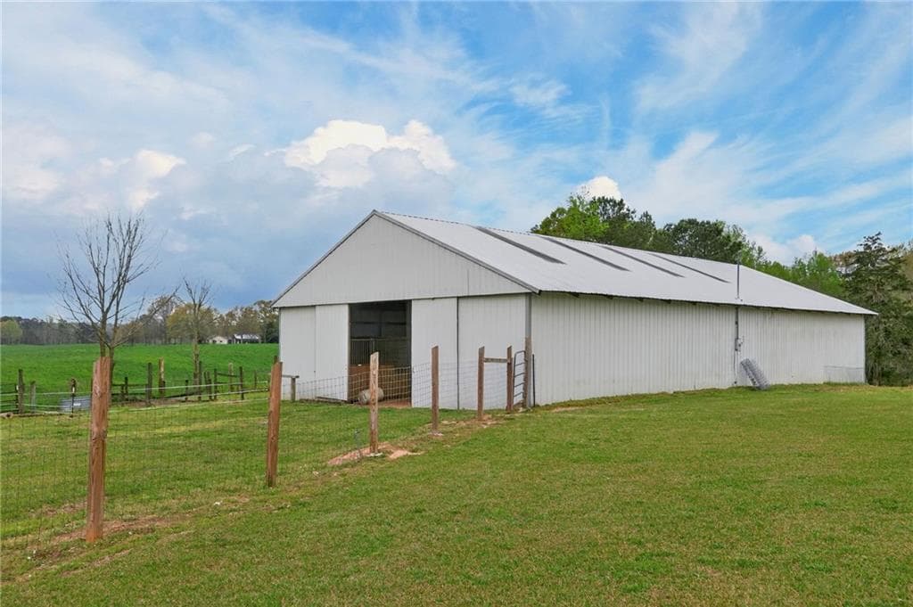 6 bedroom, 5 bathroom, 3,263 sq ft single family residence for sale at 3590 Roosterville Road, Roopville, GA 30170 — photo 6