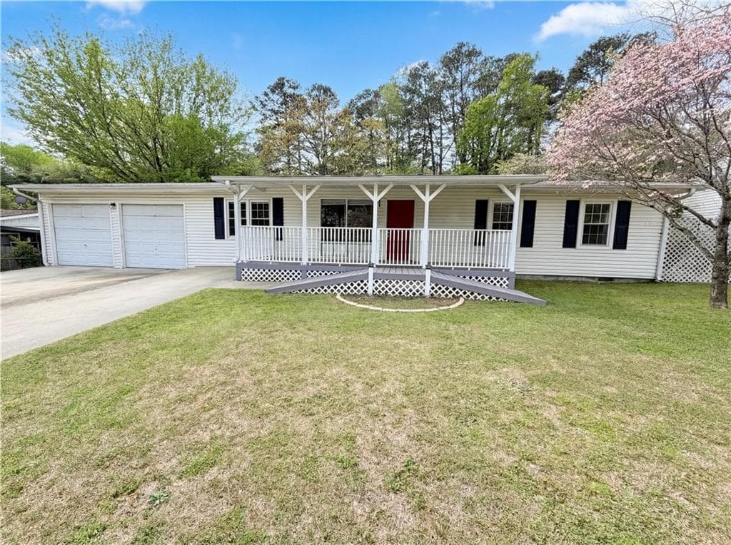 4 bedroom, 3 bathroom, 1,940 sq ft single family residence sold at 1670 Wildwood Road, Marietta, GA 30062
