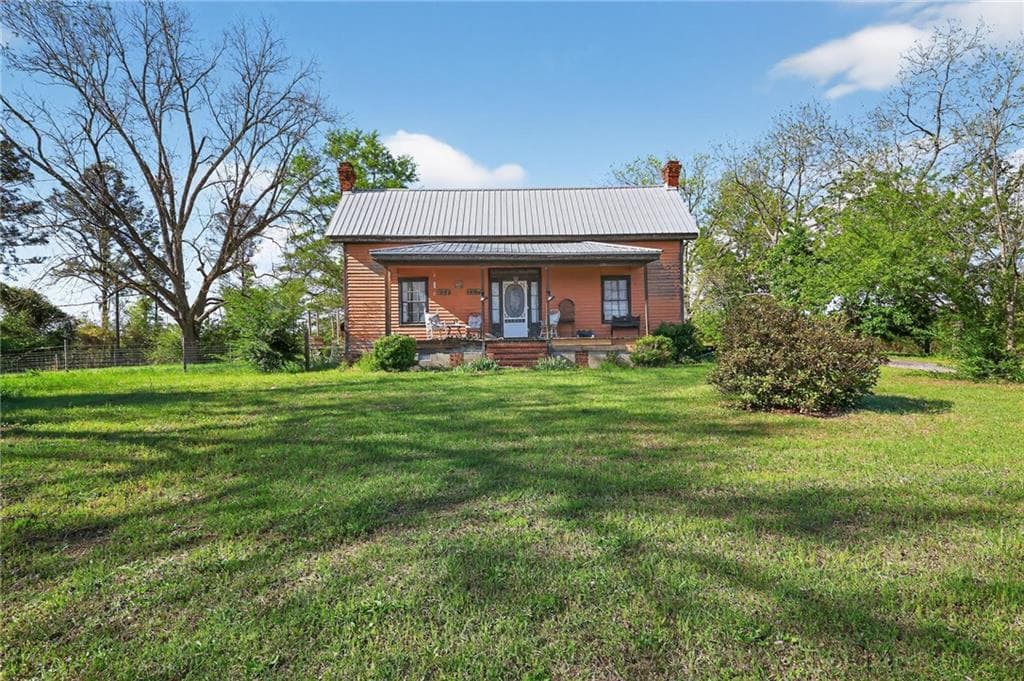 3 bedroom, 2 bathroom, 1,976 sq ft single family residence sold at 1235 Tommy Purvis Road, Reynolds, GA 31076