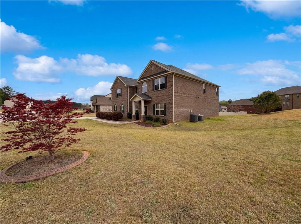 5 bedroom, 4 bathroom, 4,376 sq ft single family residence for sale at 1549 Harlequin Way, Stockbridge, GA 30281 — photo 3