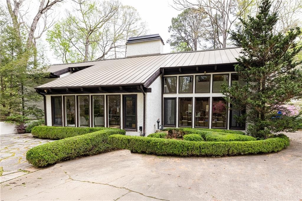 4 bedroom, 5 bathroom, 4,332 sq ft single family residence sold at 1165 Regency Road, Atlanta, GA 30327