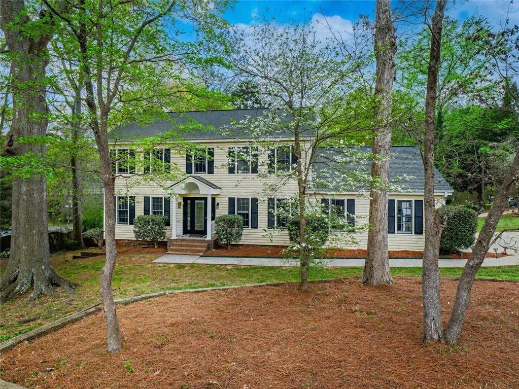 4 bedroom, 3 bathroom, 2,732 sq ft single family residence sold at 945 E Riverbend Drive, Lilburn, GA 30047