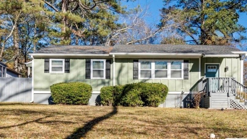3 bedroom, 2 bathroom, 1,200 sq ft single family residence for sale at 2235 Baker Road, Atlanta, GA 30318 — photo 1 of 9
