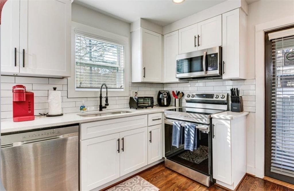 3 bedroom, 2 bathroom, 1,200 sq ft single family residence for sale at 2235 Baker Road, Atlanta, GA 30318 — photo 5