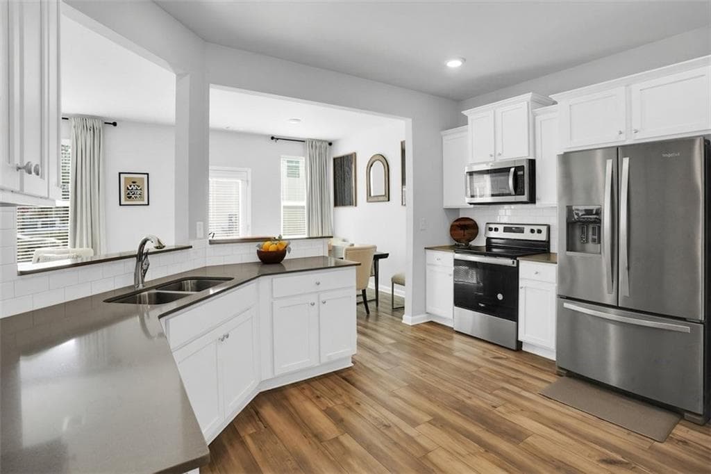 4 bedroom, 3 bathroom, 1,770 sq ft single family residence for sale at 4730 Kyle Terrace, Atlanta, GA 30349 — photo 3